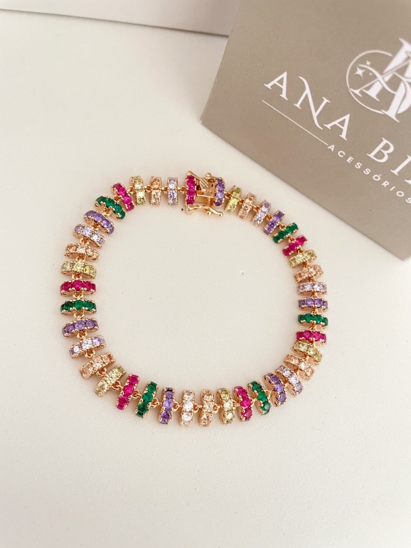 Pulseira cravejada com zirconia colorida banho em ouro 18k